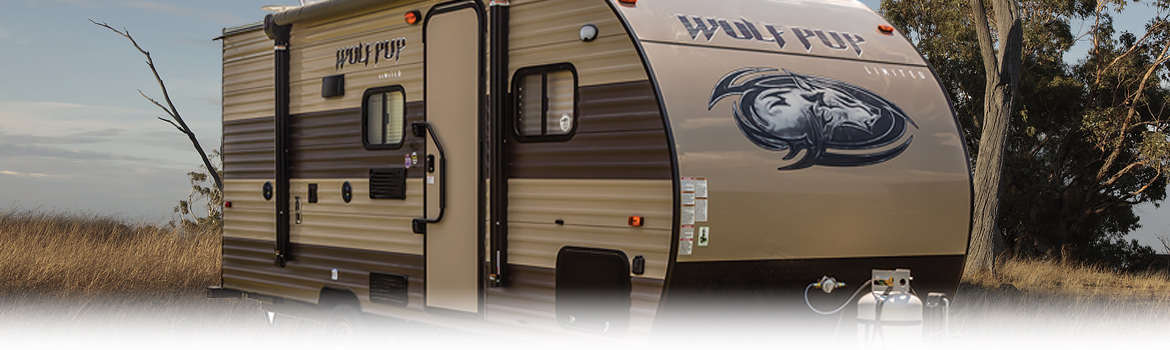2017 Forest River Cherokee Wolf Pup 16FQ Fields pop up camper parked in a outdoor setting.